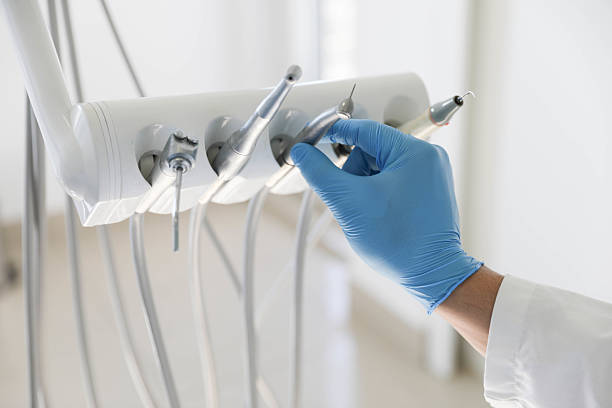 Professional Invisalign Clear Aligners technician working in Baldwin, MI